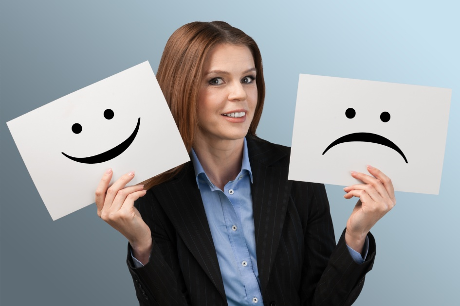 A man with two contrasting emotions - on the left, he appears sad and pensive, while on the right, he is smiling brightly and radiating happiness.